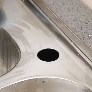 how to drill a hole in a stainless steel sink