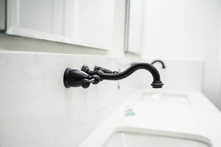 pros and cons of wall mounted faucets